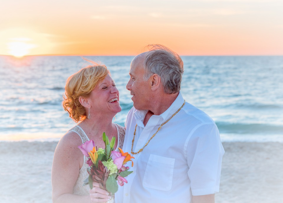 older couple beach wedding